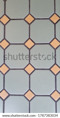 mosaic from gray and pink tiles