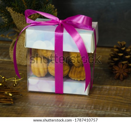 Retro sweets with caramel on wood in gift box