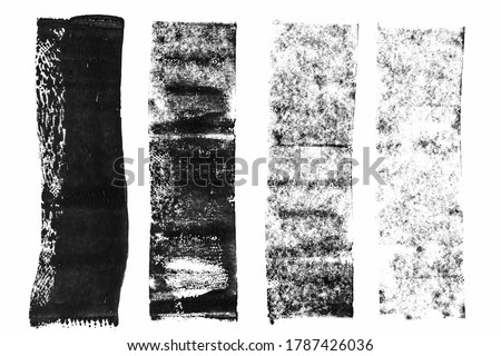 macro photo of black lino ink remain, linocutting paint roller texture on white paper background.
 Royalty-Free Stock Photo #1787426036