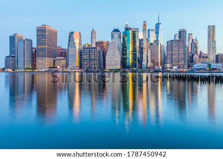 Sunrise over Lower Manhattan; Early Morning Reflections in the East River; New York, NY