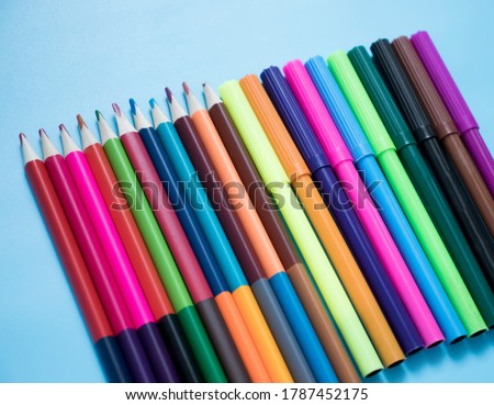 Abstract composition of a set wooden colour pencils. back to school concept