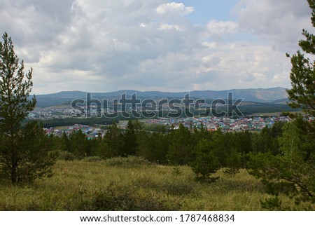 Breathtaking summer landscape Blue sky Fresh air of the Forest Field Mountains Top View