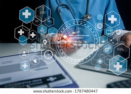 Double exposure of healthcare And Medicine concept. Doctor and modern virtual screen interface,  Background toned image blurred.