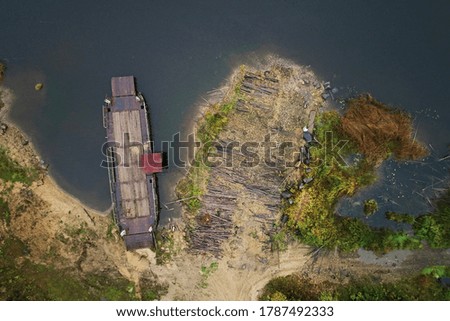 Top view of the river bank with ferry barge. Aerial photography