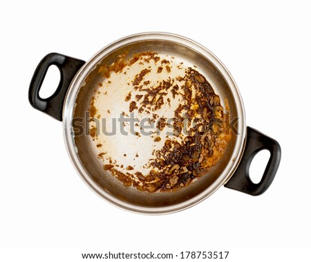 Dirty cooking pot on a white background. Royalty-Free Stock Photo #178753517