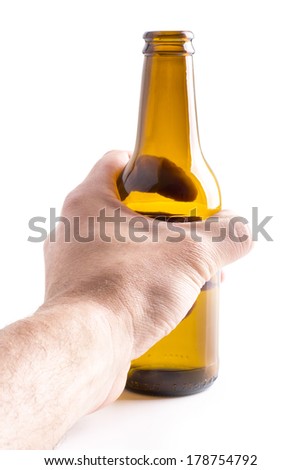  Hand holding empty beer bottle on white background