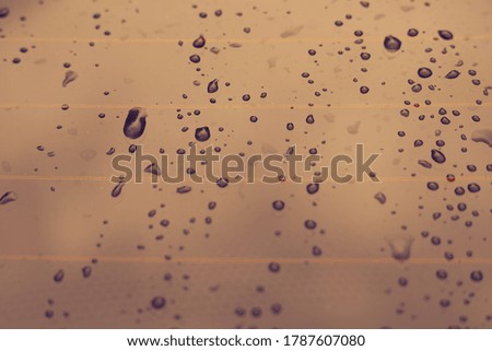 The water on the glass is an ancient abstract space background wallpaper for text.