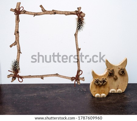 frame in the interior with wooden decoration of an owl bird, mock up