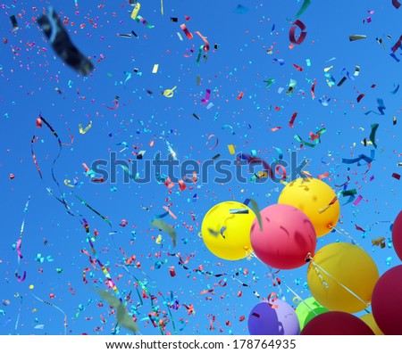 multicolored balloons and confetti in the city festival #13