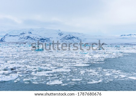 Aereal winter landscape view of Jokulsarlon lagoon, Iceland. Beautiful landscape picture of icelandic glacier lagoon bay in winter.