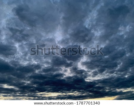 Cloudscape background image with dark clouds