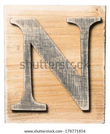 Wooden alphabet letter block isolated on white