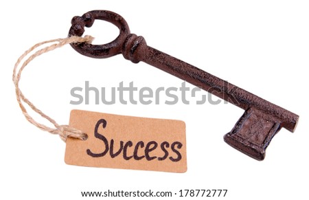 Key to success, Conceptual photo. Isolated on white