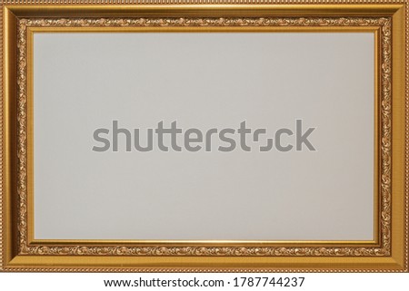 Gold frame with white background. Copy space.