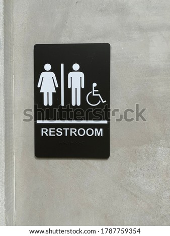 Men, women, and handicap bathroom sign