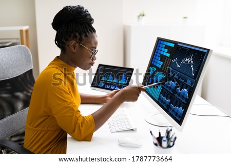 African American Business Data Analyst Woman Using Computer Royalty-Free Stock Photo #1787773664