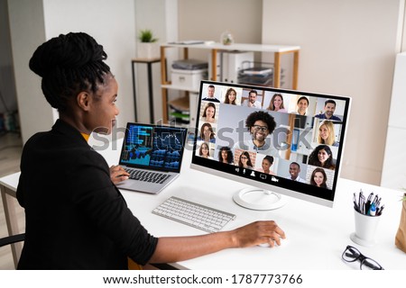 Watching Video Conference Business Webinar On Computer Royalty-Free Stock Photo #1787773766