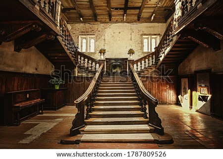 Staircase in an old abandoned palace Royalty-Free Stock Photo #1787809526