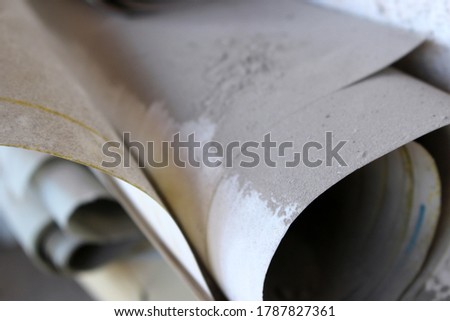 paper covered with dirt and dust 