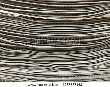 A stack of gray doormat