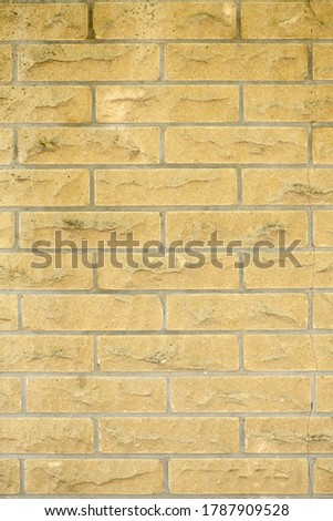 New and Clean Yellow Brick Wall. High resolution photo. Full depth of field (DOF).