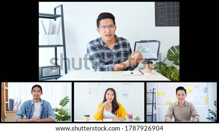 Group on young Asian business people, office coworkers on video online conference call, remote team meeting collage screen. New normal social distancing lifestyle, work from home concept Royalty-Free Stock Photo #1787926904