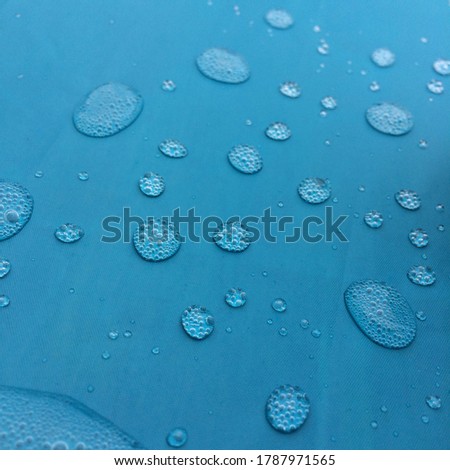 Water at drops blue area Royalty-Free Stock Photo #1787971565