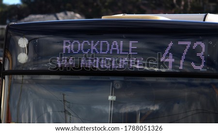 Digital LED bus signage reading 'Rockdale via Arncliffe 473"