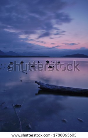 Still water lake at dusk. Lake Kussharo, Hokkaido, Japan.
