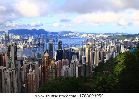 Hong Kong Victoria Harbor View and city skyline from the Victoria Peak in afternoon on sunny day 