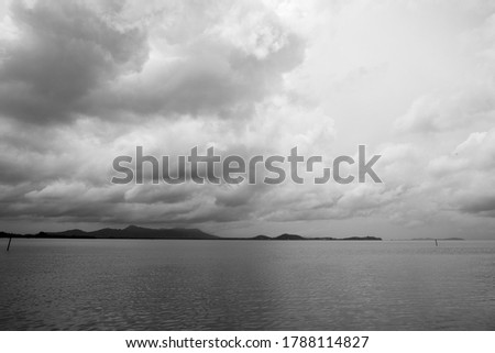 Sea view with mountain and sky background on Black and White color tone. Royalty-Free Stock Photo #1788114827