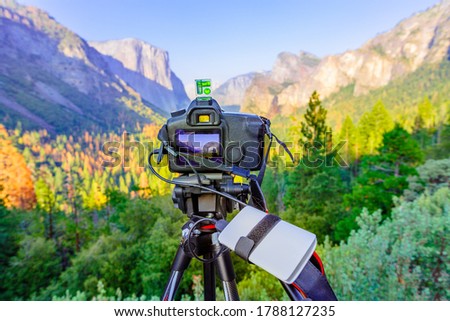 time-lapse of panoramic photography at El Capitan and Half Dome at sunset: El Capitan, Half Dome and Bridalveil Fall from the iconic Tunnel View. American Holidays on the road.