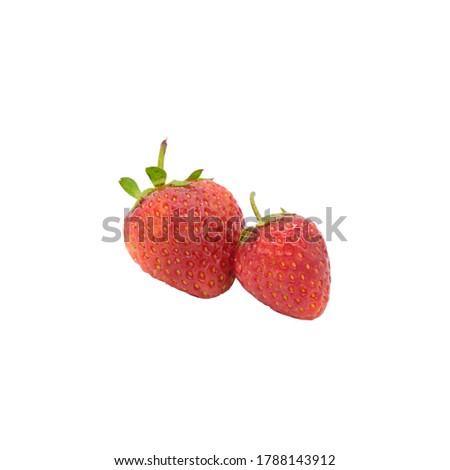 Two isolated strawberries on a white background