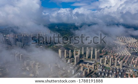 Aerial photography of China's second tier coastal cities under the fog, with high prices, was taken in Dalian, Liaoning Province, China