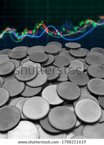 coins isolated on blur stock market graph background