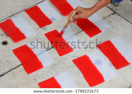 Making red and white flag attributes to welcome the independence of the Republic of Indonesia.