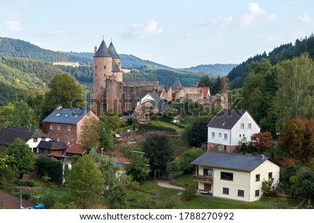 Landscape photo of Muerlenbach in the Eifel, Germany in spring with the Bertrada castle.