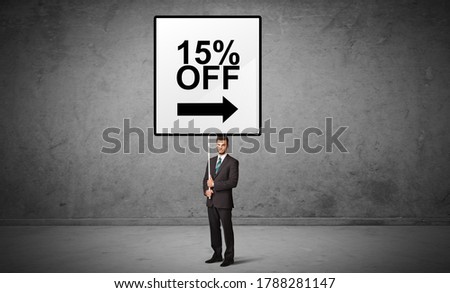 business person holding a traffic sign with 15% OFF inscription, new idea concept