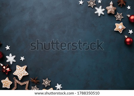 Christmas background for greeting cards, banners and party posters. New Year's eve celebration, sale, presents concept. Festive decorations on dark table, flat lay with copy space
