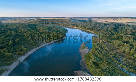 sunrise on the Don river, aerial view of morning mist at sunrise, morning mist on the river,  Aerial view of mystical river at sunrise with fog Royalty-Free Stock Photo #1788432590