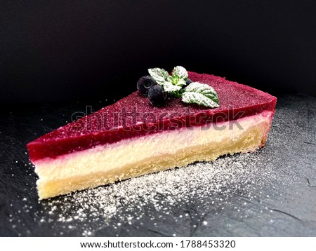 food photo summer dessert cheesecake on black background