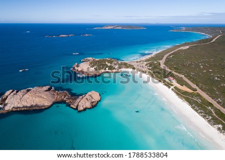 Twilight Beach in Esperance Western Australia offers stunning turquoise waters and a magical coastline with Twilight Island - a popular swimming rock where people jump off and enjoy the summer heat. Royalty-Free Stock Photo #1788533804