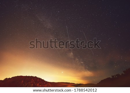 Milky Way, Jupiter and Saturn Planets and satellite  in the night.