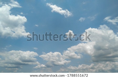 Beautiful natural scenery view of white cumulus clouds in the blue sky over the city, nature landscape photography, seasonal weather conditions and atmospheric moods Royalty-Free Stock Photo #1788551672