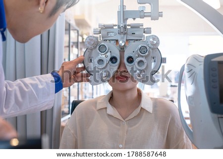 The expert is testing the vision test with diagnostic ophthalmology equipment, Professional medical machine, diagnostic ophthalmology equipment, selective focus Royalty-Free Stock Photo #1788587648