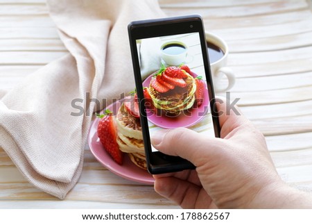 smartphone shot food photo  - pancakes for breakfast with fresh strawberries Royalty-Free Stock Photo #178862567
