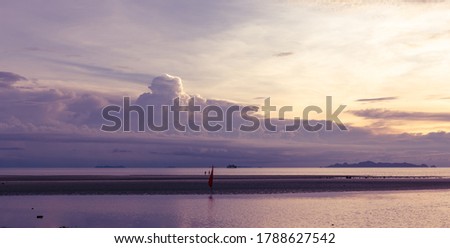 Panoramic tropical  purple sea sky sunset with big cloud background