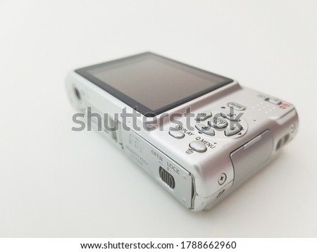 Metallic Look Digital Compact Camera With Black LCD Screen  Isolated on White Background