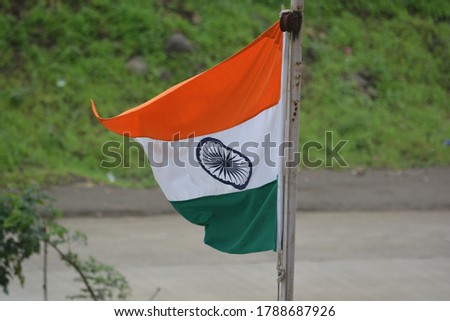 a waving tricolor indian national flag