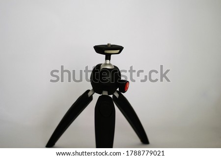 mini tripod used to stabilize the camera in photography and video shooting